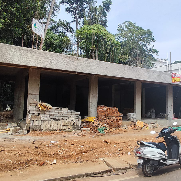 Commercial Building for Mr. Shoukkathali at Killy done by greenhouse Designers and Builders